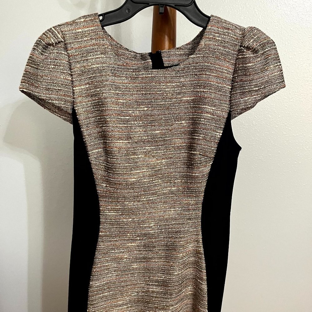 Form fitting metallic dress